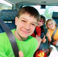 Boy with seatbelt in a car